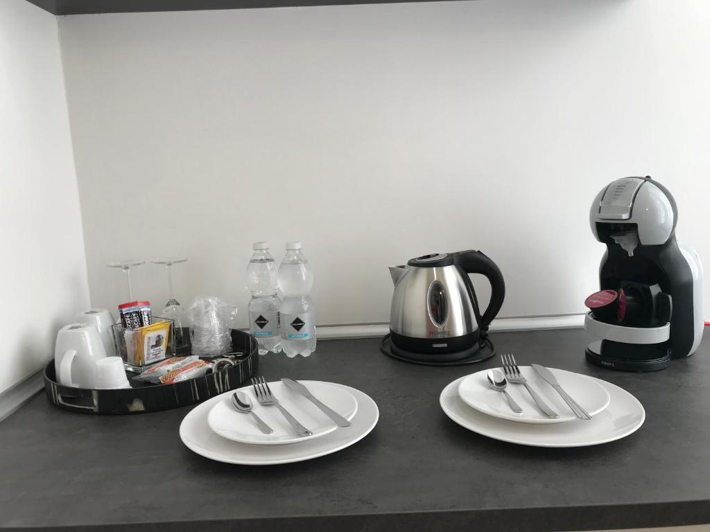 Příslušenství pro přípravu čaje a kávy v ubytování Alba rooms