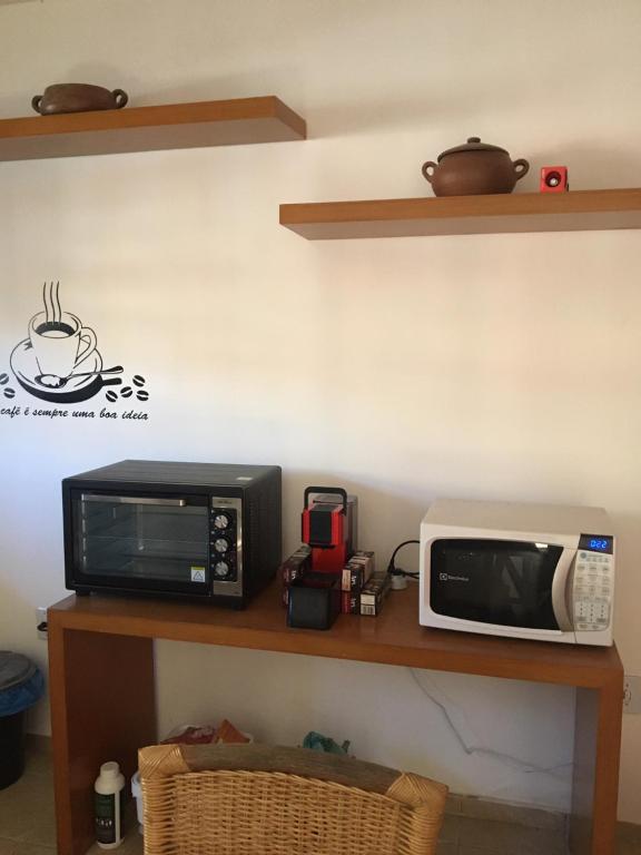 Kuchyň nebo kuchyňský kout v ubytování Cond Residencial Resort Pipa Chalés Triplex - Centro de Pipa