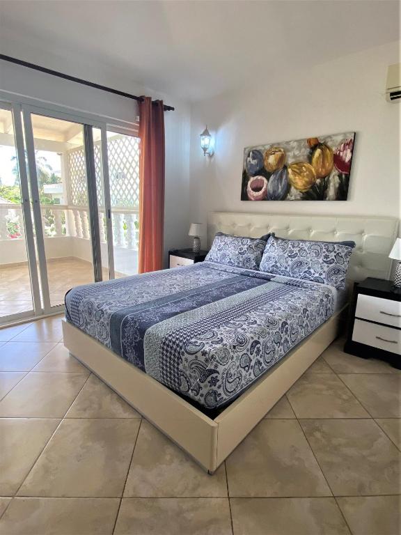 Postel nebo postele na pokoji v ubytování Diamond Hotel Cabarete