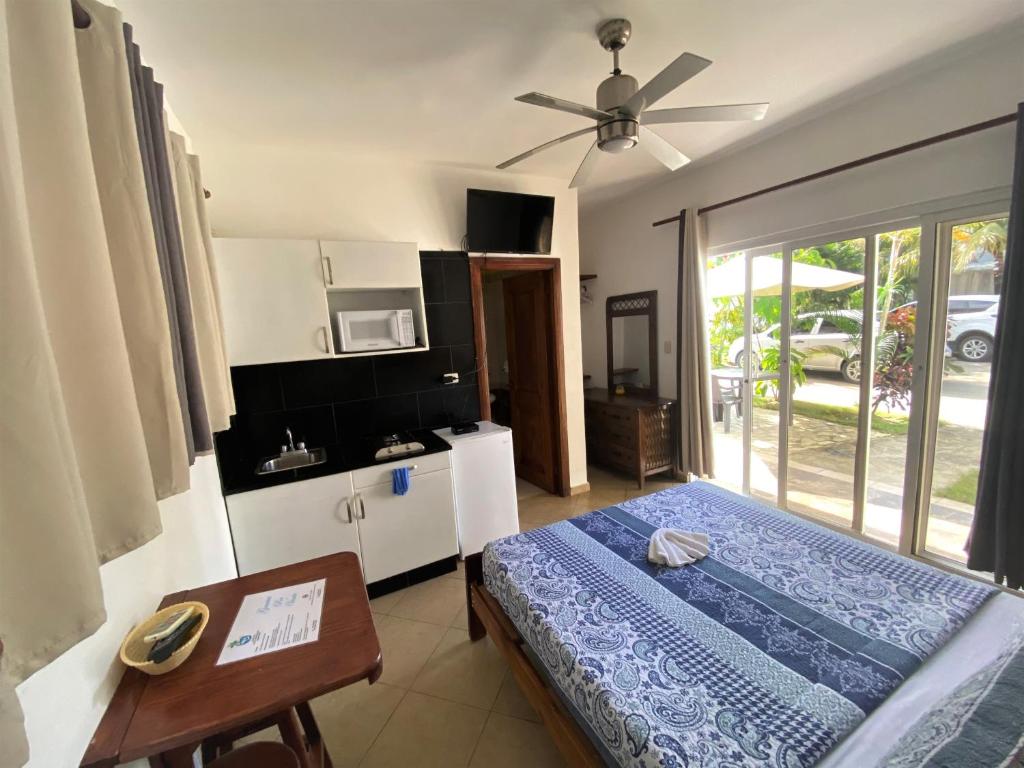 Postel nebo postele na pokoji v ubytování Diamond Hotel Cabarete