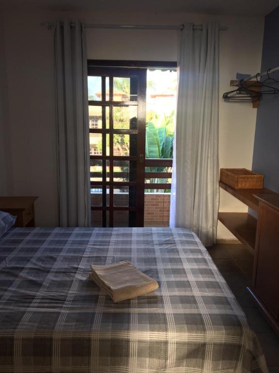Postel nebo postele na pokoji v ubytování Cond Residencial Resort Pipa Chalés Triplex - Centro de Pipa
