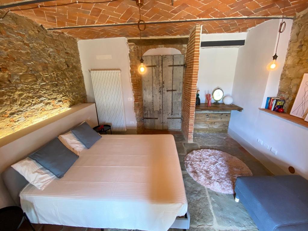 Postel nebo postele na pokoji v ubytování Il Cerro