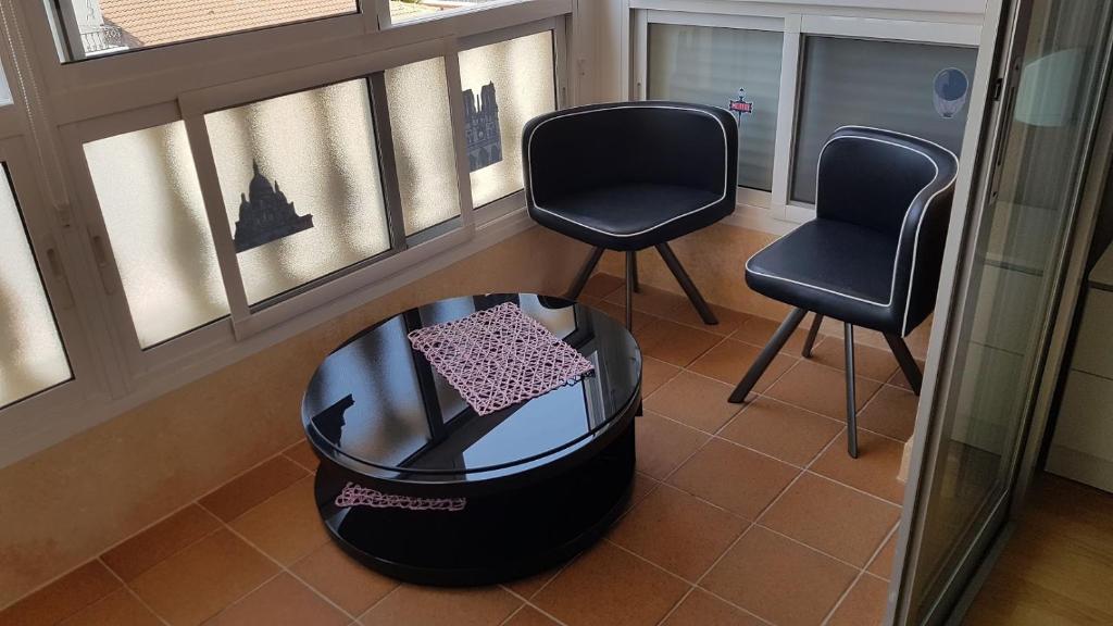 Posedenie v ubytovaní Apartamento con tres dormitorios Vista Mar
