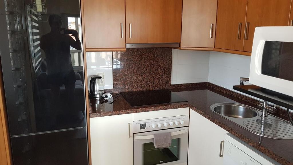 Kuchyňa alebo kuchynka v ubytovaní Apartamento con tres dormitorios Vista Mar