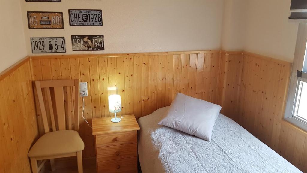 Posteľ alebo postele v izbe v ubytovaní Apartamento con tres dormitorios Vista Mar