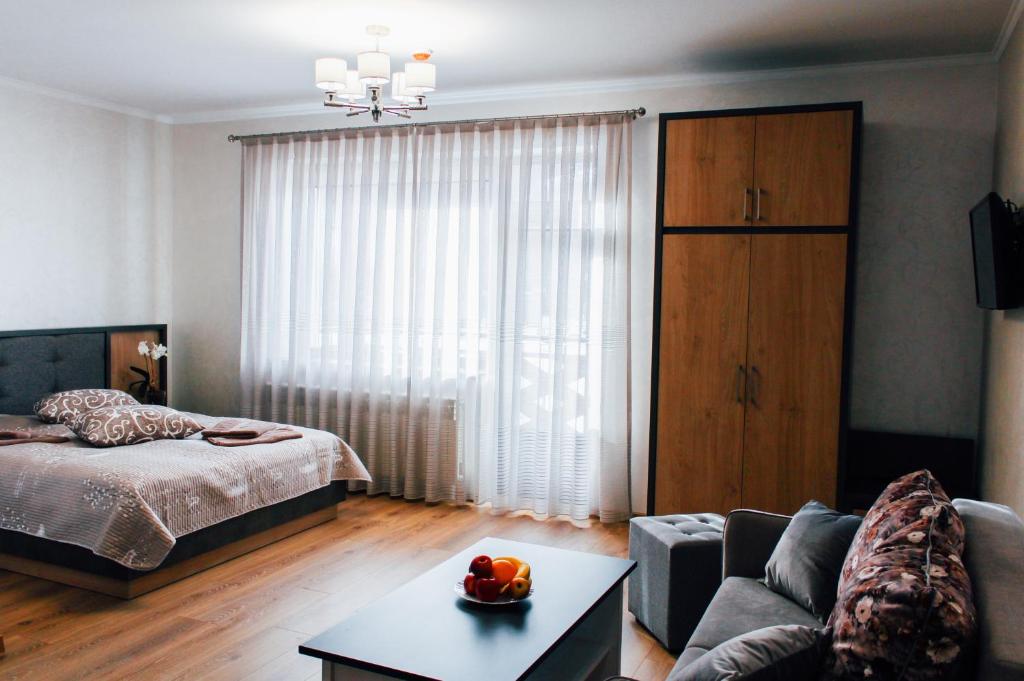 Postel nebo postele na pokoji v ubytování HOTEL Баймонт