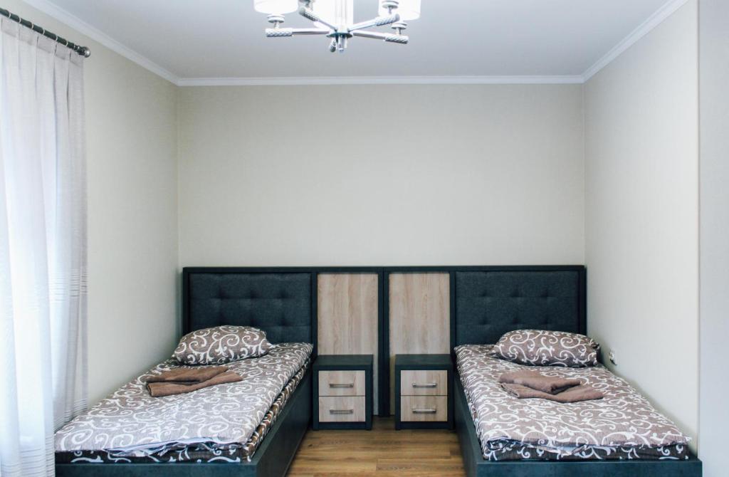 Postel nebo postele na pokoji v ubytování HOTEL Баймонт