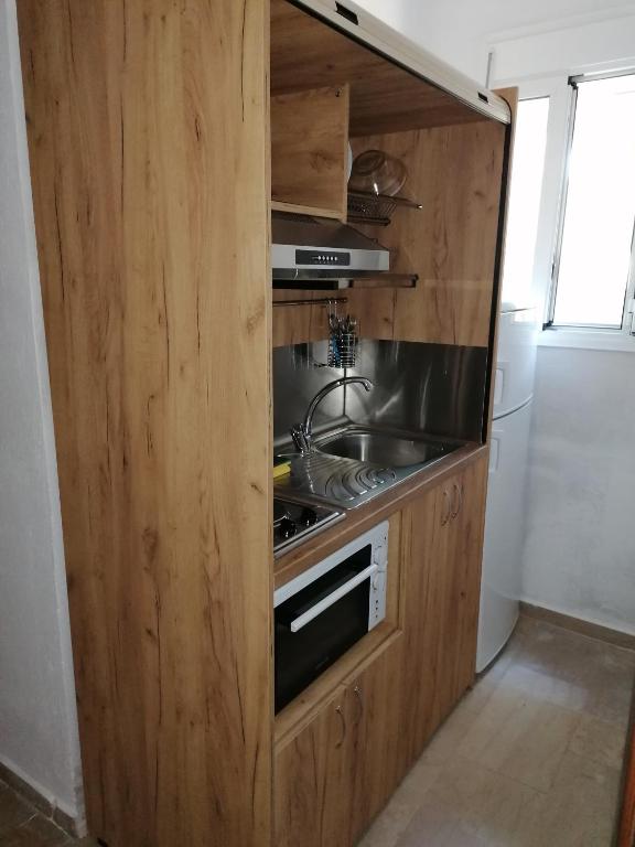 Kuchyň nebo kuchyňský kout v ubytování Velikis Apartments