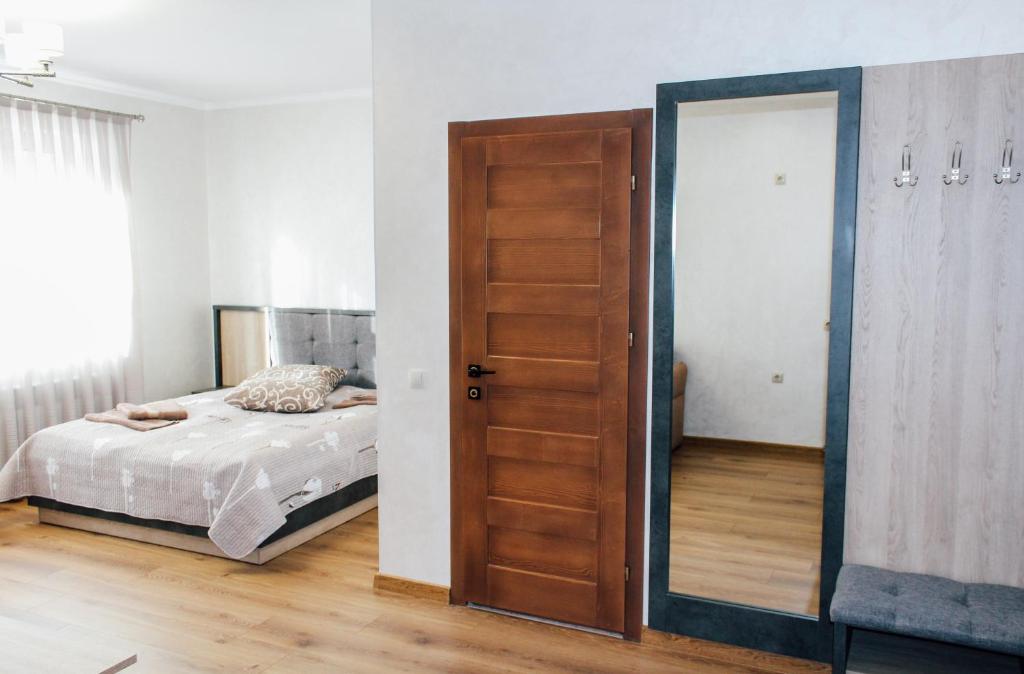Postel nebo postele na pokoji v ubytování HOTEL Баймонт