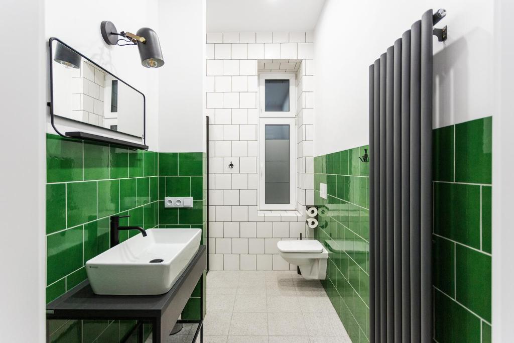 Kúpeľňa v ubytovaní Apartamenty Teatralna