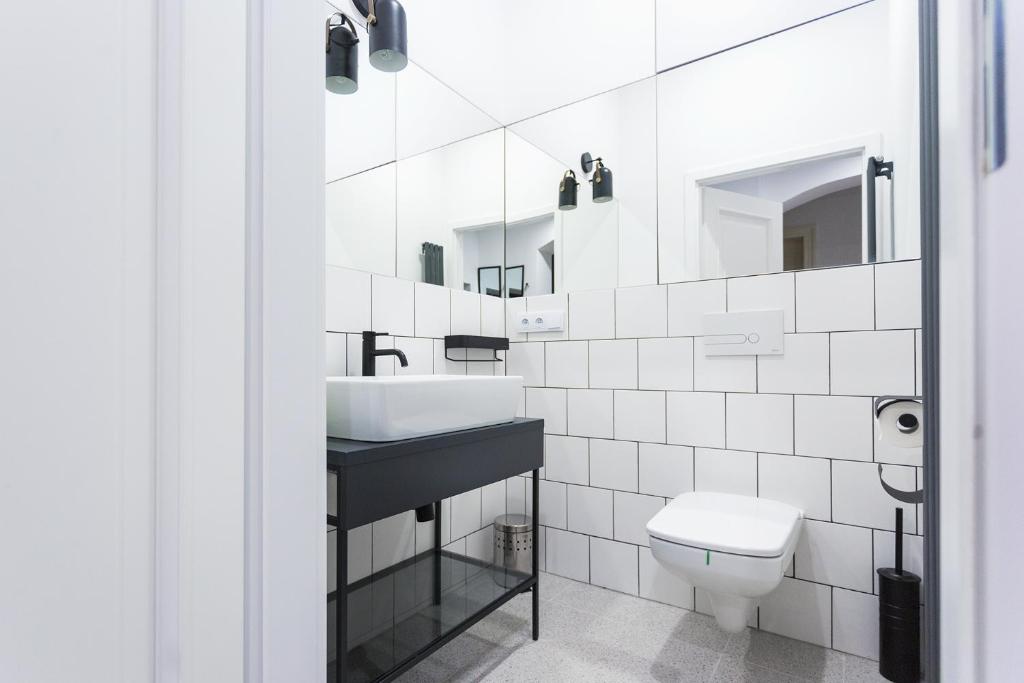 Kúpeľňa v ubytovaní Apartamenty Teatralna