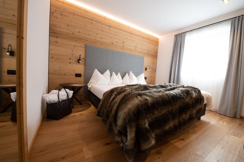 Posteľ alebo postele v izbe v ubytovaní Casteller Apartment Deluxe