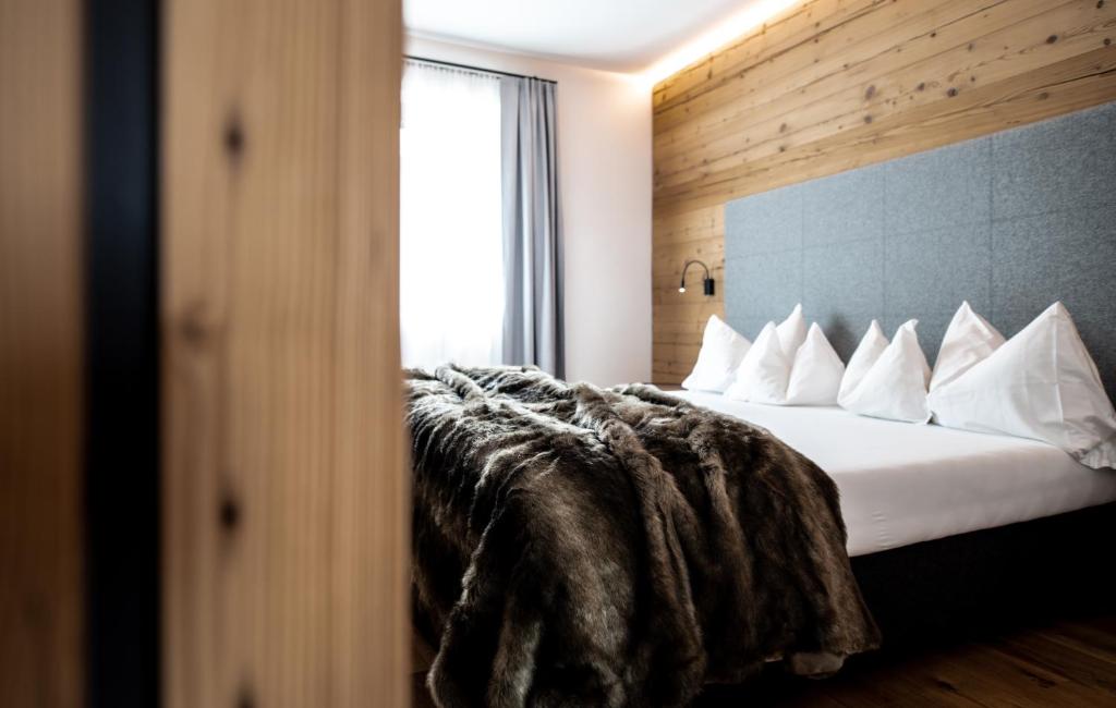 Posteľ alebo postele v izbe v ubytovaní Casteller Apartment Deluxe