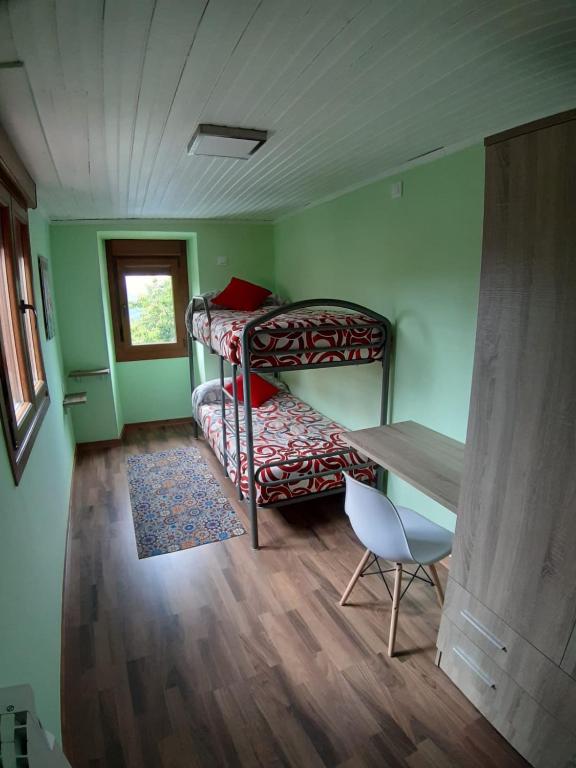 A bed or beds in a room at A Casa Da Asturiana