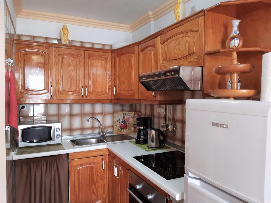 Kuchyň nebo kuchyňský kout v ubytování Summerland LC Holiday Home