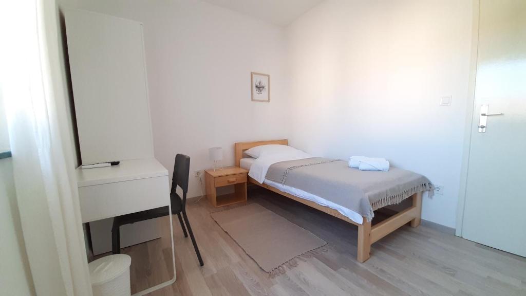 Posteľ alebo postele v izbe v ubytovaní Posteja Rooms
