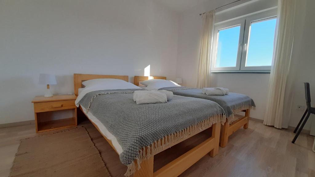 Posteľ alebo postele v izbe v ubytovaní Posteja Rooms
