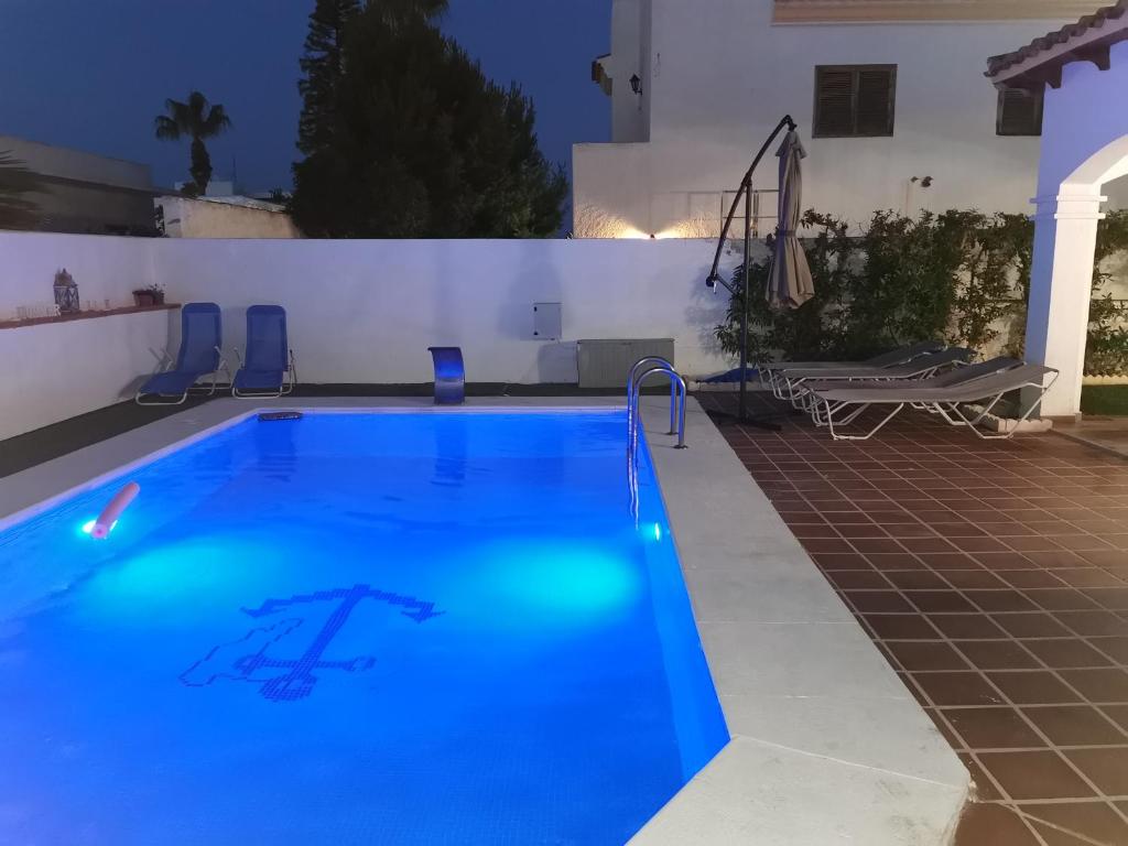 Bazén v ubytování Villa PaloMayor nebo v jeho okolí