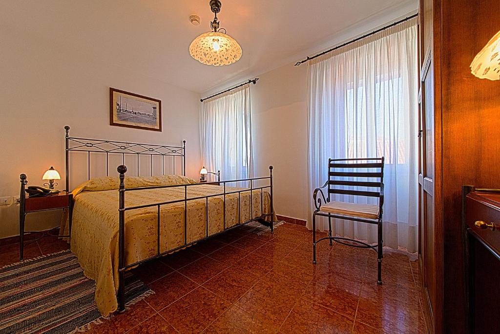 Postel nebo postele na pokoji v ubytování Villetta Phasiana