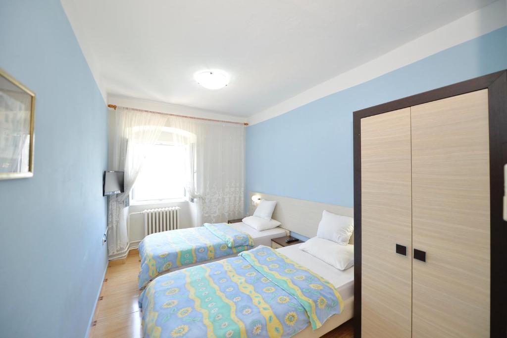 Cama ou camas em um quarto em Pana-Eustahije 253