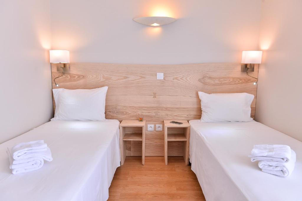 Postel nebo postele na pokoji v ubytování Logis Hôtel Restaurant Le Chêne Vert