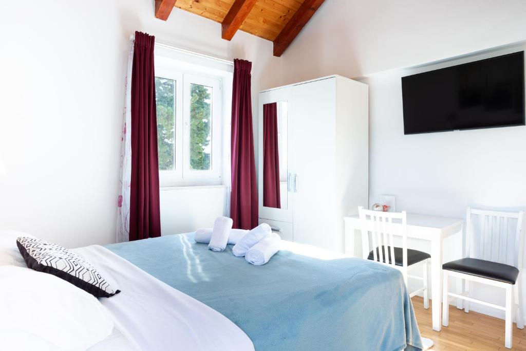 Postel nebo postele na pokoji v ubytování Orsan Residence