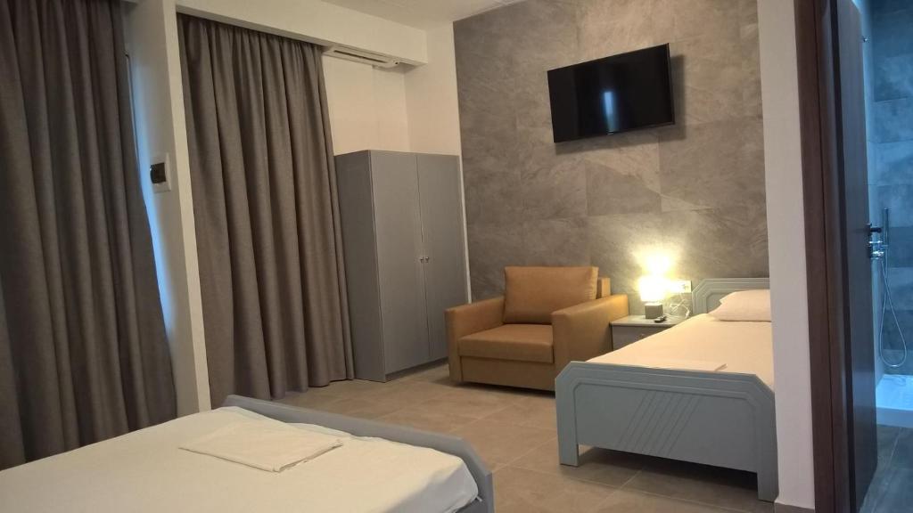Postel nebo postele na pokoji v ubytování Oasis
