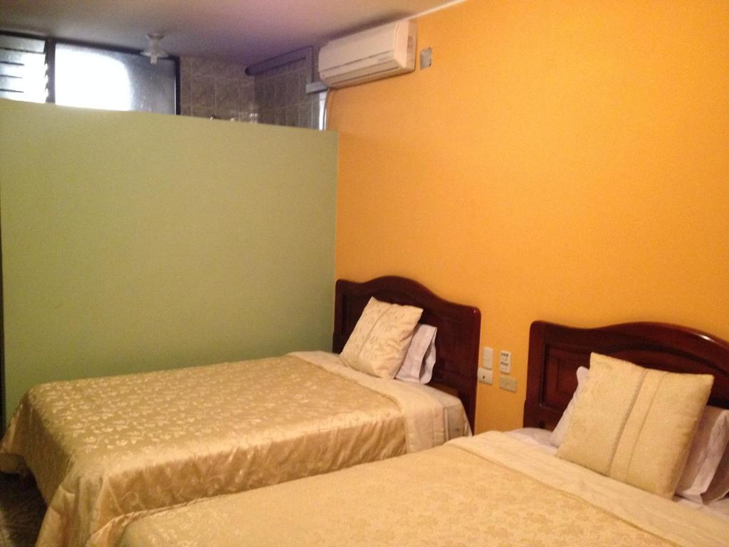 Postel nebo postele na pokoji v ubytování Hotel Sánchez Internacional