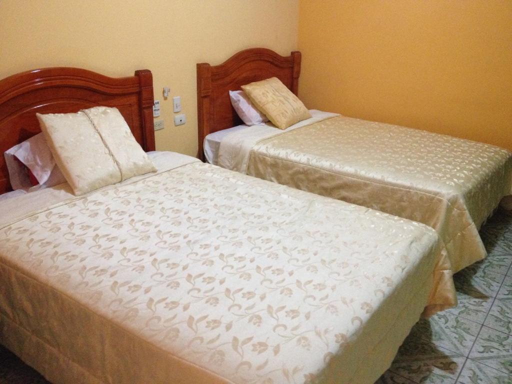 Postel nebo postele na pokoji v ubytování Hotel Sánchez Internacional