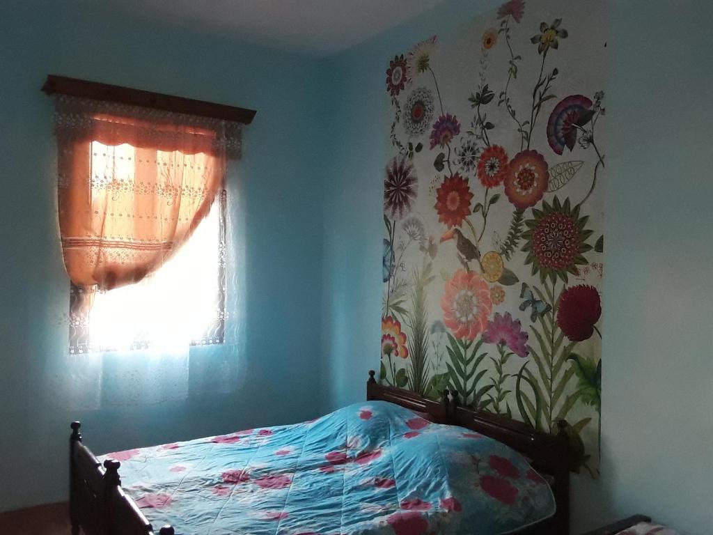 Postel nebo postele na pokoji v ubytování Guest House Buche 219