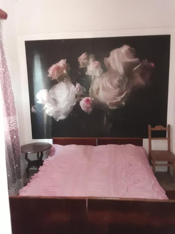 Postel nebo postele na pokoji v ubytování Guest House Buche 219