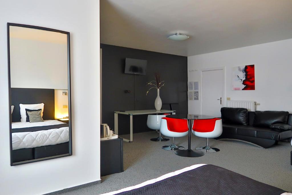 Posezení v ubytování Hotel Adoma