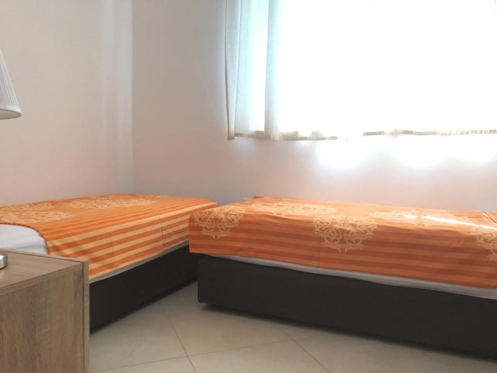 Posteľ alebo postele v izbe v ubytovaní Villa Lanterna