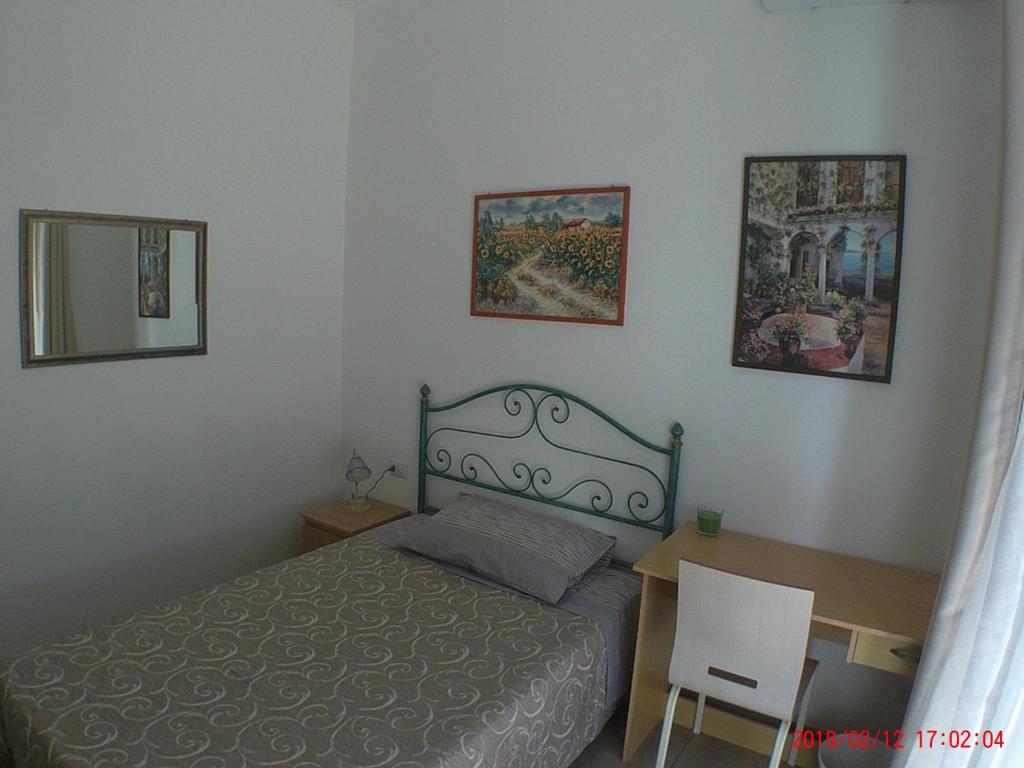 Posteľ alebo postele v izbe v ubytovaní un passo dal mare