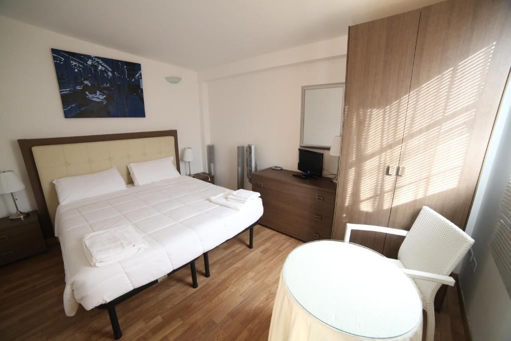 Posteľ alebo postele v izbe v ubytovaní Bed & Breakfast Idomeneo 63