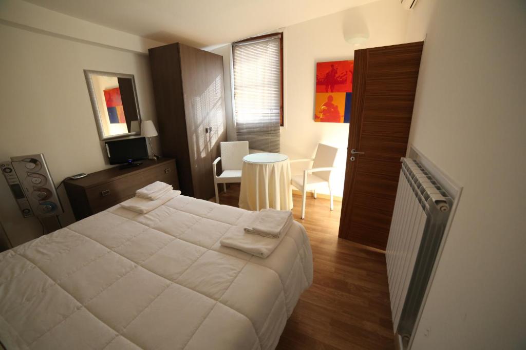 Posteľ alebo postele v izbe v ubytovaní Bed & Breakfast Idomeneo 63