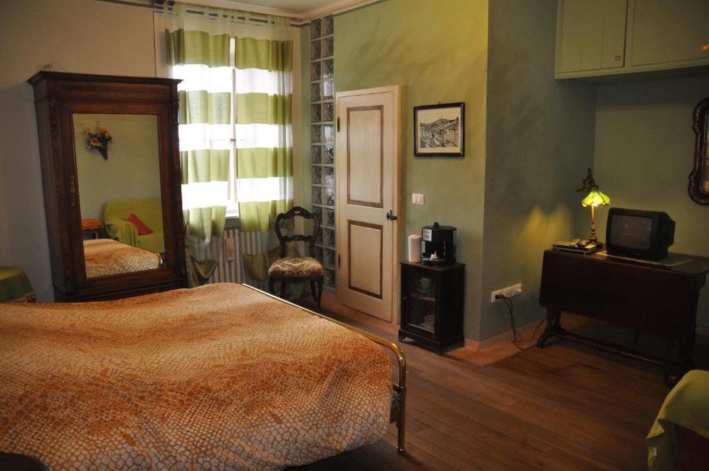 Postel nebo postele na pokoji v ubytování B&B Il Molinello