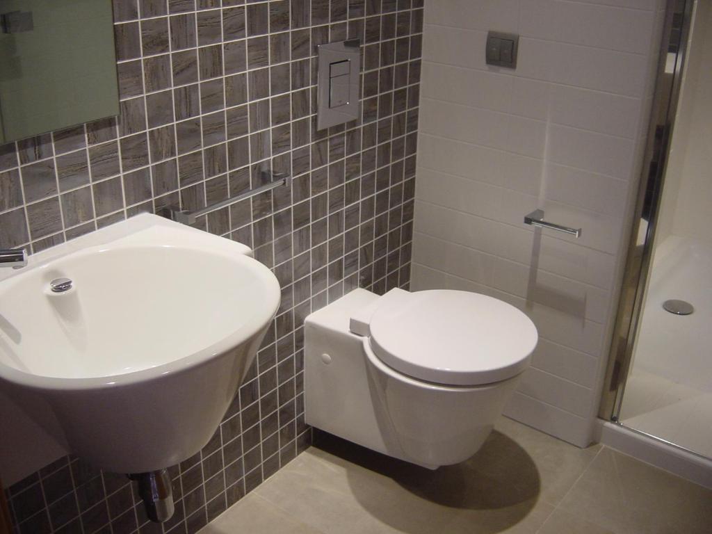 Kúpeľňa v ubytovaní Apartamentos Bravosol VyB