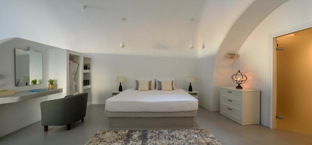 Postel nebo postele na pokoji v ubytování White Dream Suites