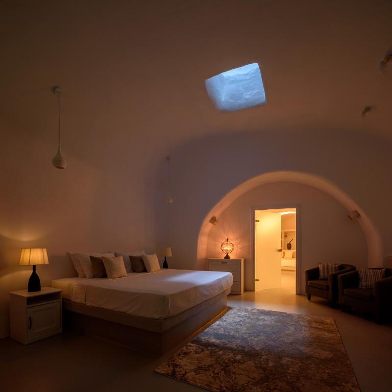 Postel nebo postele na pokoji v ubytování White Dream Suites