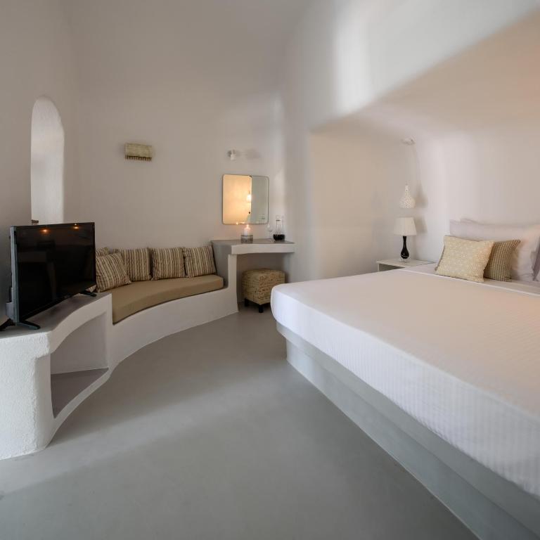 Postel nebo postele na pokoji v ubytování White Dream Suites