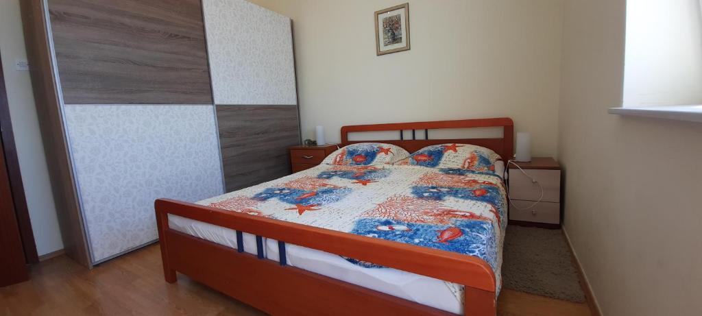 Posteľ alebo postele v izbe v ubytovaní Apartmani Zorzo
