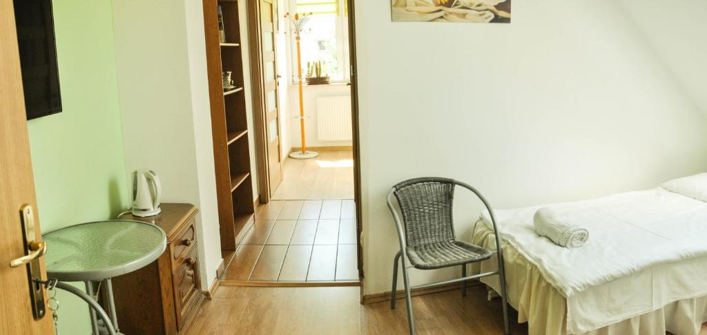 Postel nebo postele na pokoji v ubytování Oaza U Tadeusza
