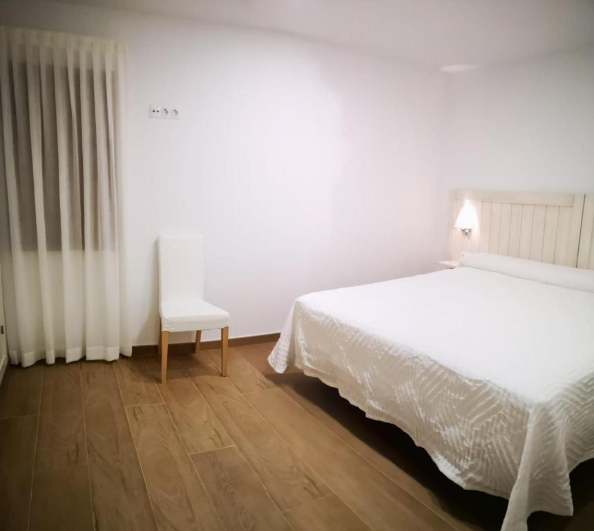 Postel nebo postele na pokoji v ubytování AG Apartamentos en Conil