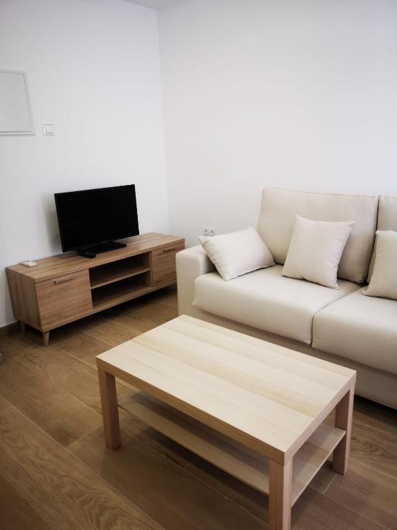 TV a/nebo společenská místnost v ubytování AG Apartamentos en Conil