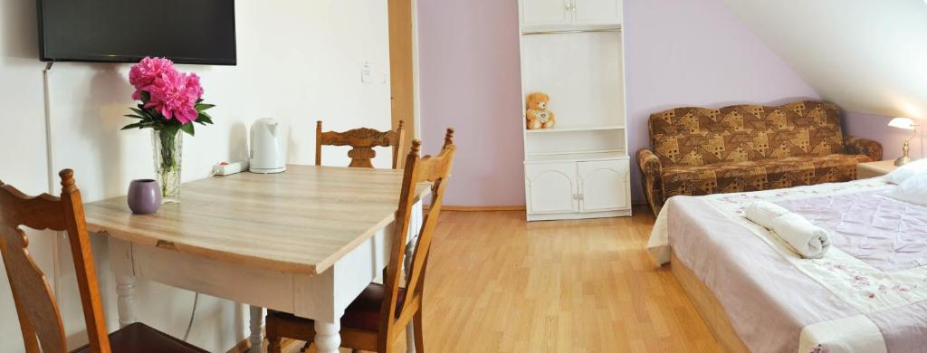 Postel nebo postele na pokoji v ubytování Oaza U Tadeusza