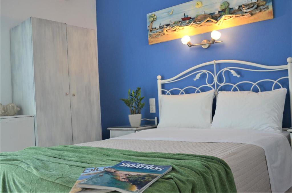 Postel nebo postele na pokoji v ubytování Hotel Kastro