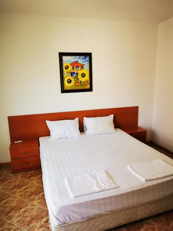 Postel nebo postele na pokoji v ubytování Jelezchevi Guest Rooms