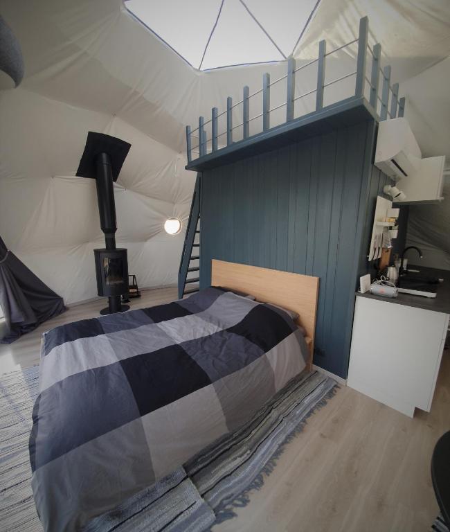 Postel nebo postele na pokoji v ubytování Glamping DiDille
