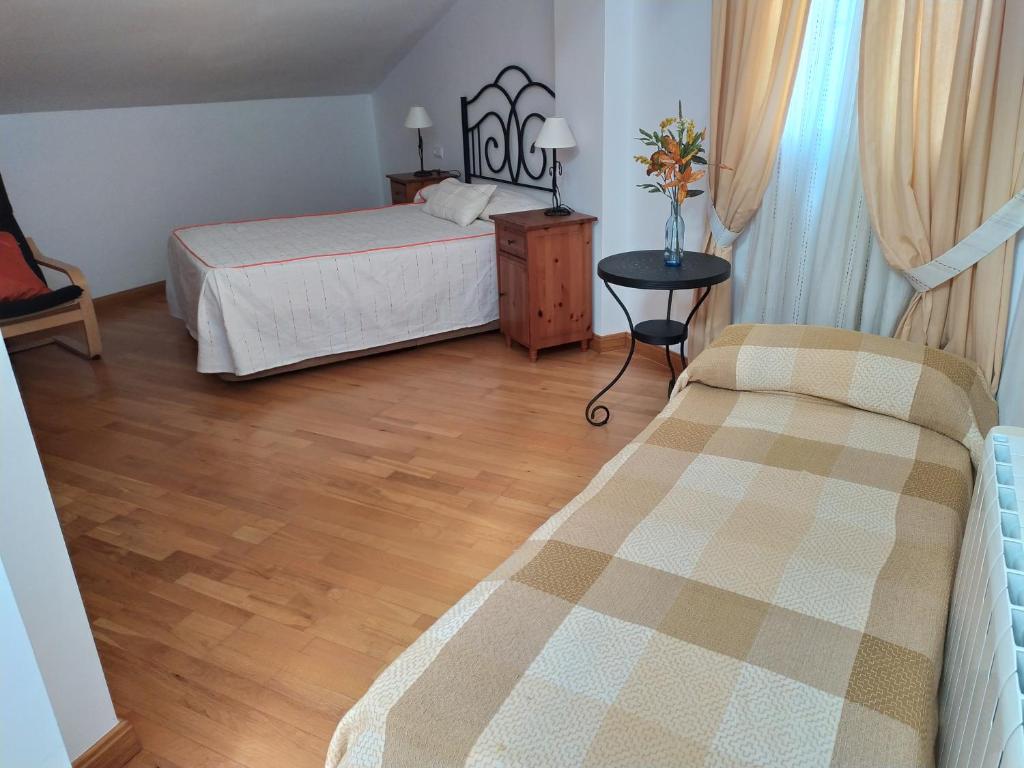 Postel nebo postele na pokoji v ubytování Vivienda Majaceite